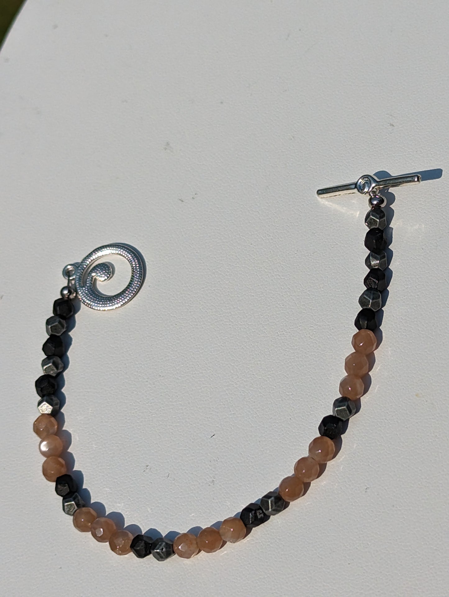 Sunstone and Charcoal-colored Beaded Bracelet with Toggle Clasp