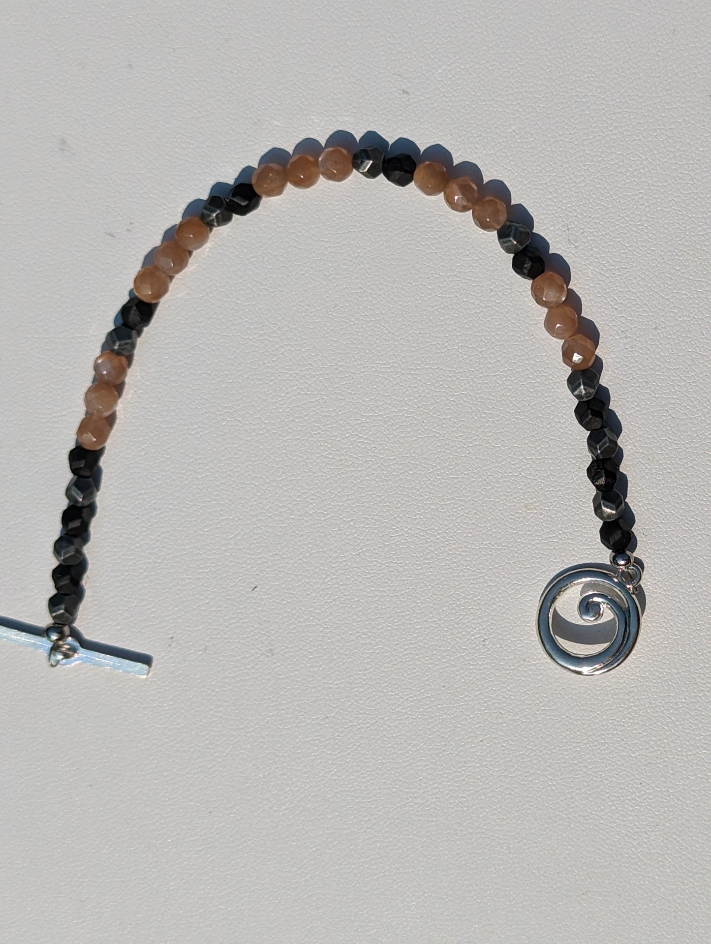 Sunstone and Charcoal-colored Beaded Bracelet with Toggle Clasp