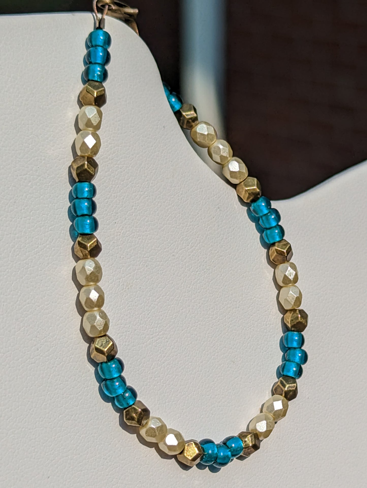 Bracelet with Teal, Pearlesque, and Brass Beads