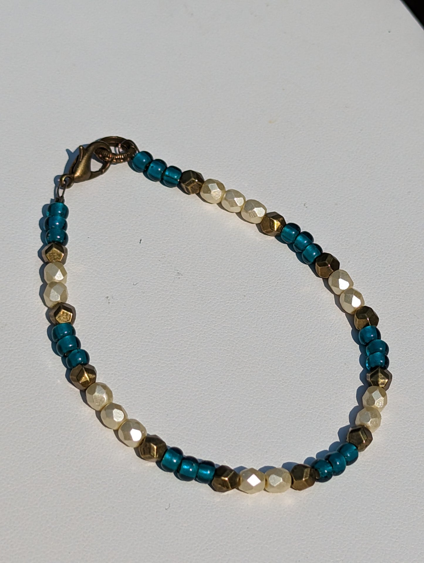 Bracelet with Teal, Pearlesque, and Brass Beads