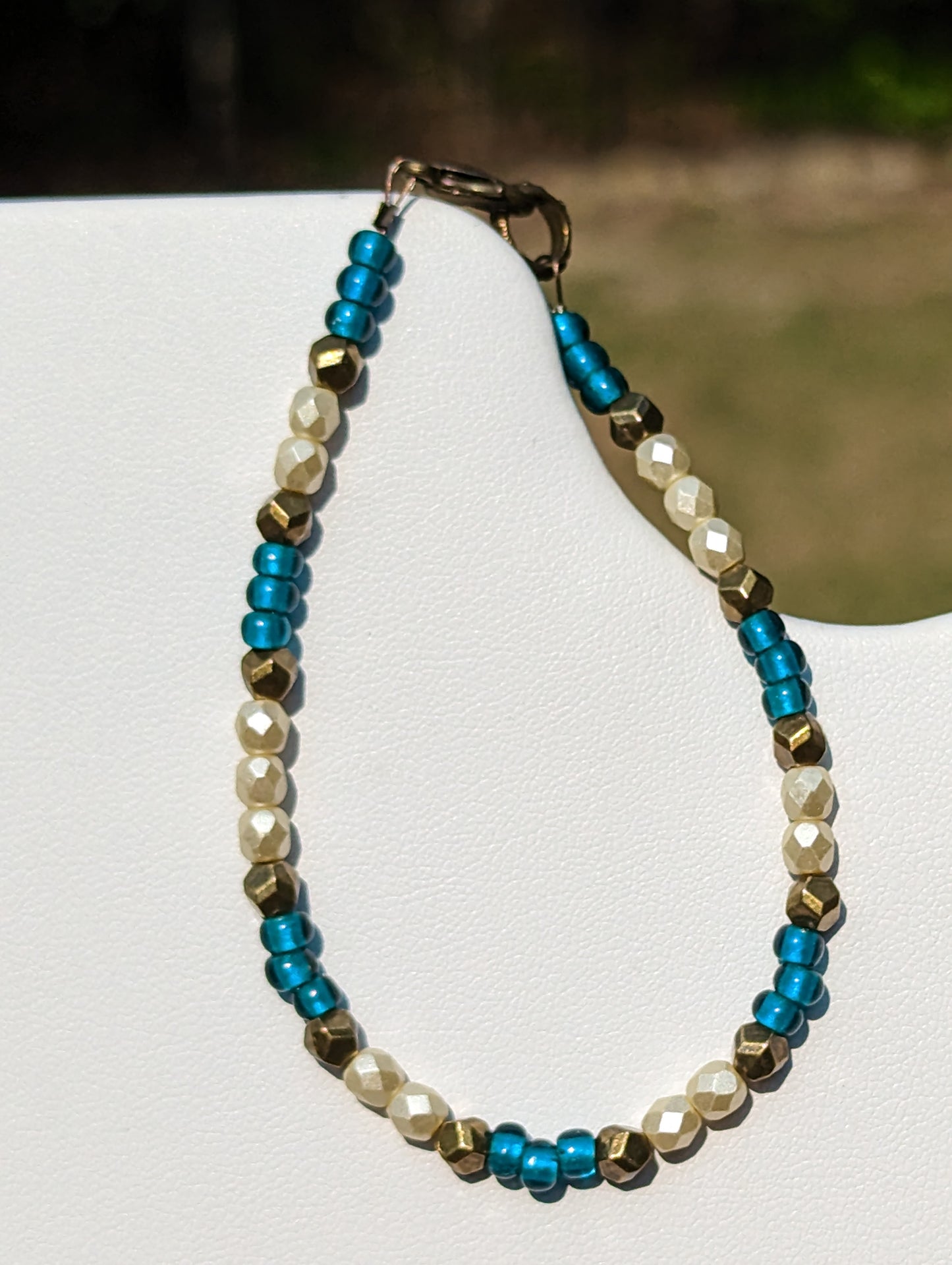 Bracelet with Teal, Pearlesque, and Brass Beads