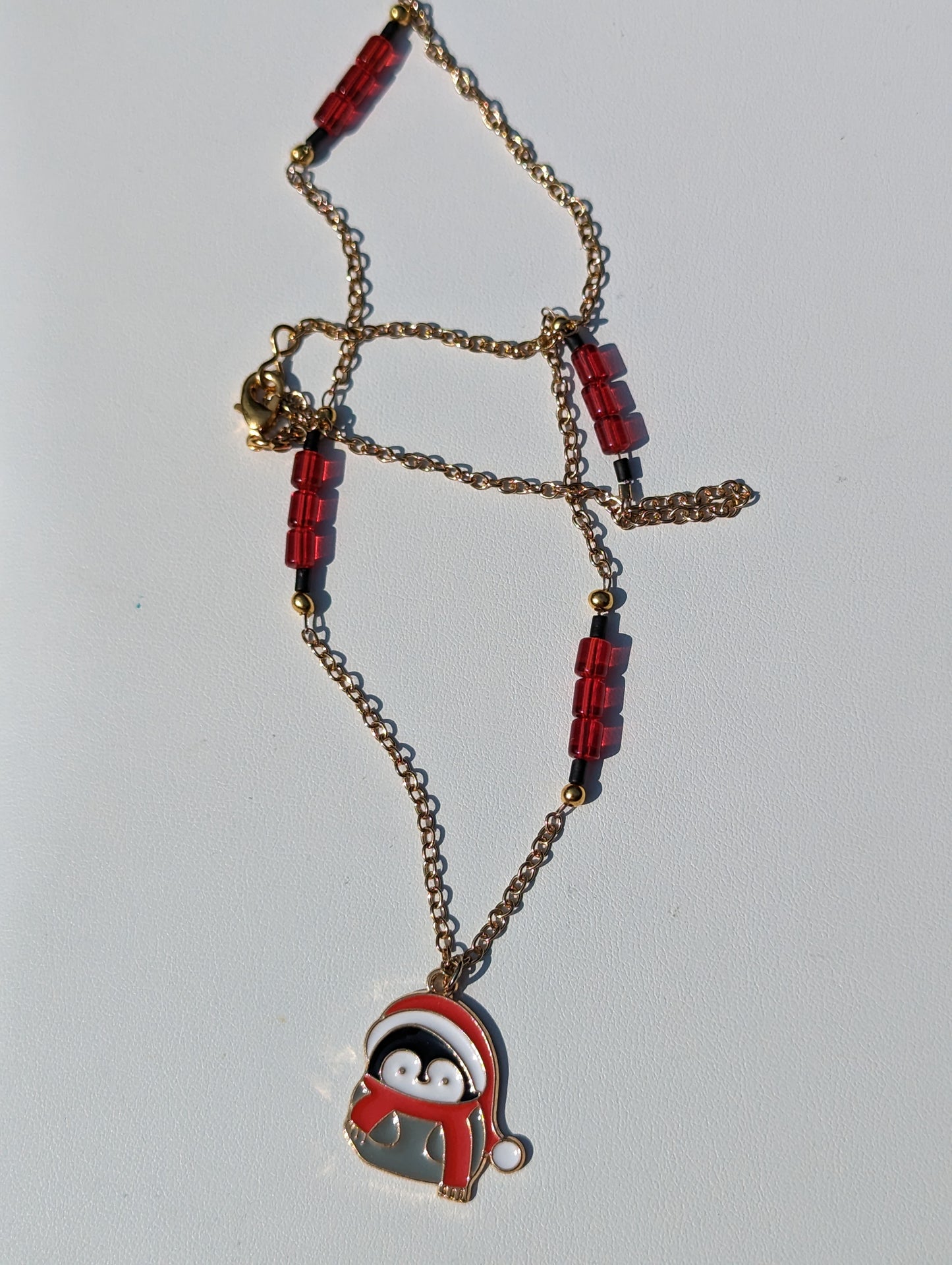 Santa Penguin Charm on Gold-tone Necklace