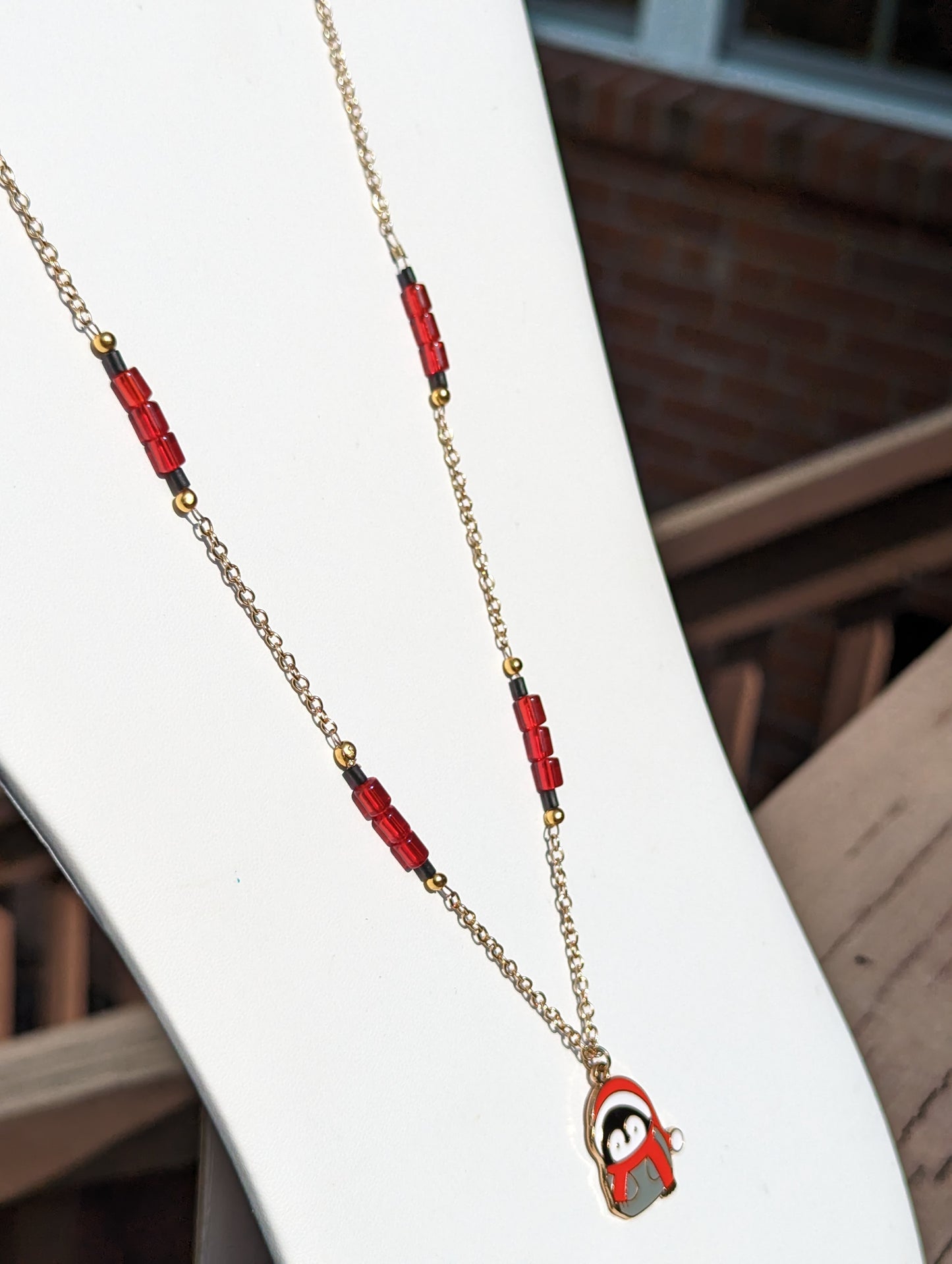 Santa Penguin Pendant on Gold-tone Necklace