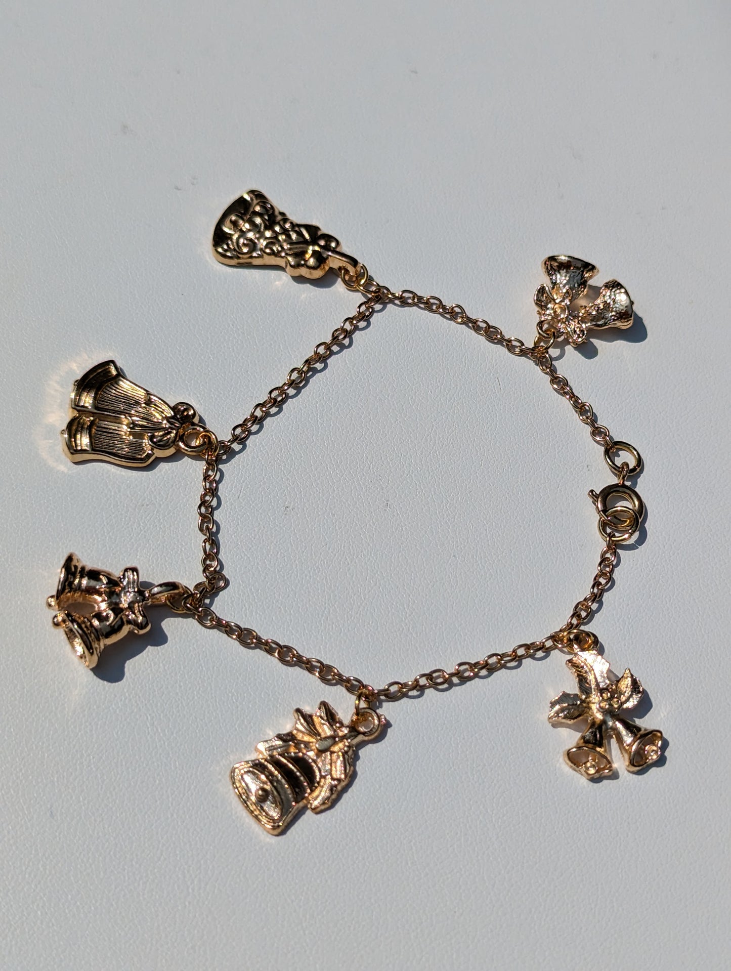 Long Gold-toned Holiday Bells Charm Bracelet