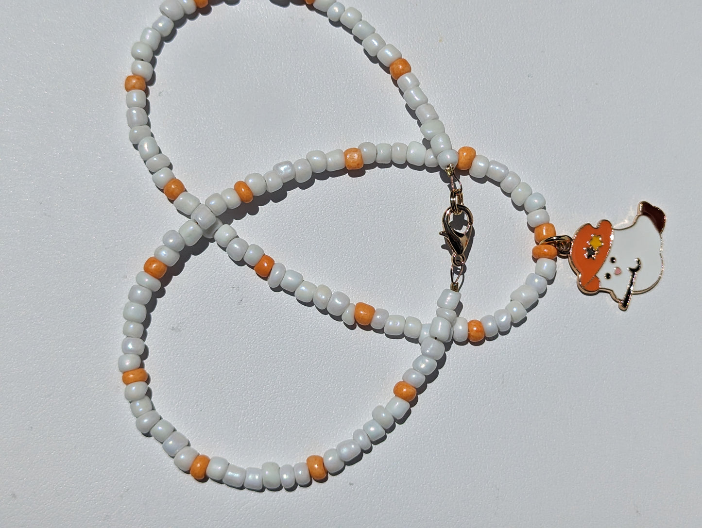 Friendly Ghost Pendant on White and Orange Beaded Necklace