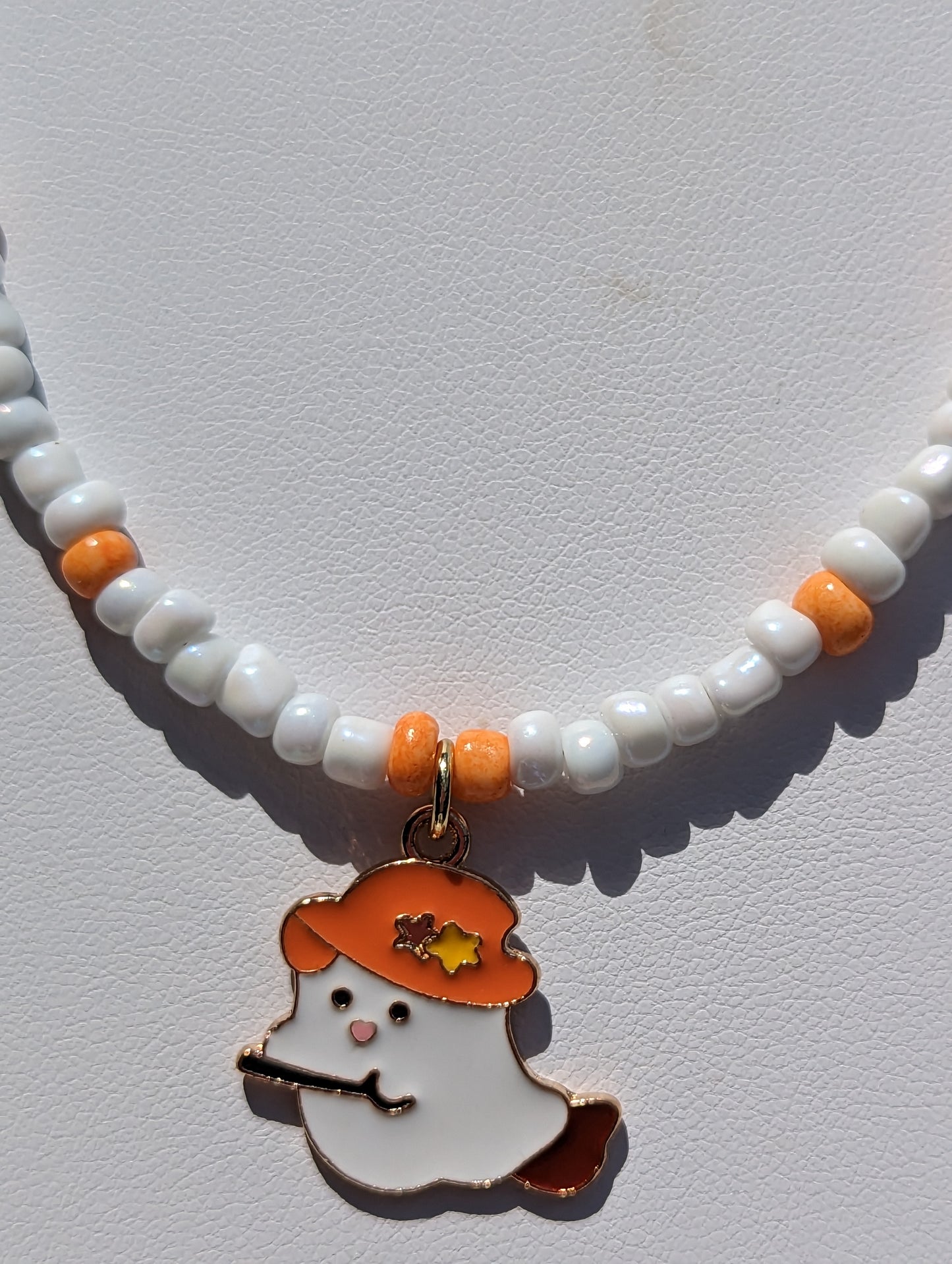 Friendly Ghost Pendant on White and Orange Beaded Necklace