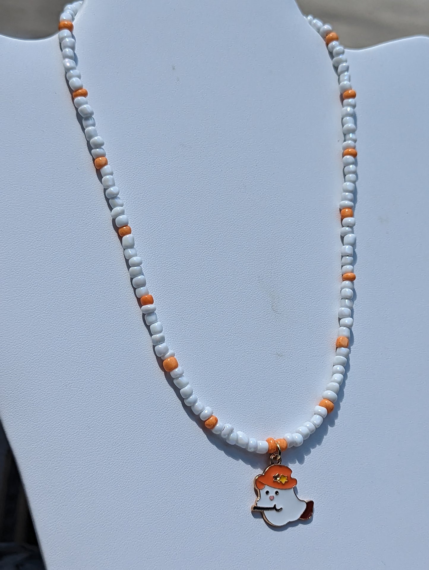 Friendly Ghost Pendant on White and Orange Beaded Necklace