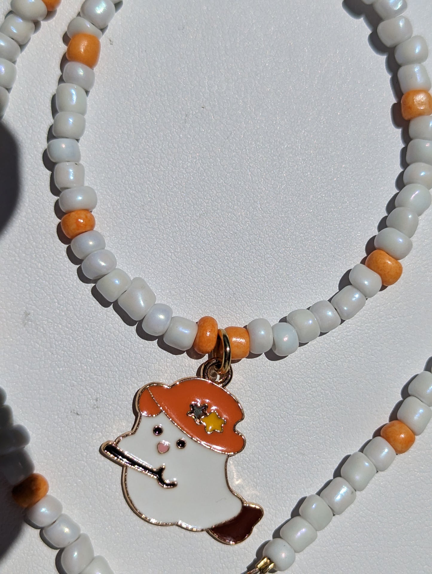 Friendly Ghost Pendant on White and Orange Beaded Necklace