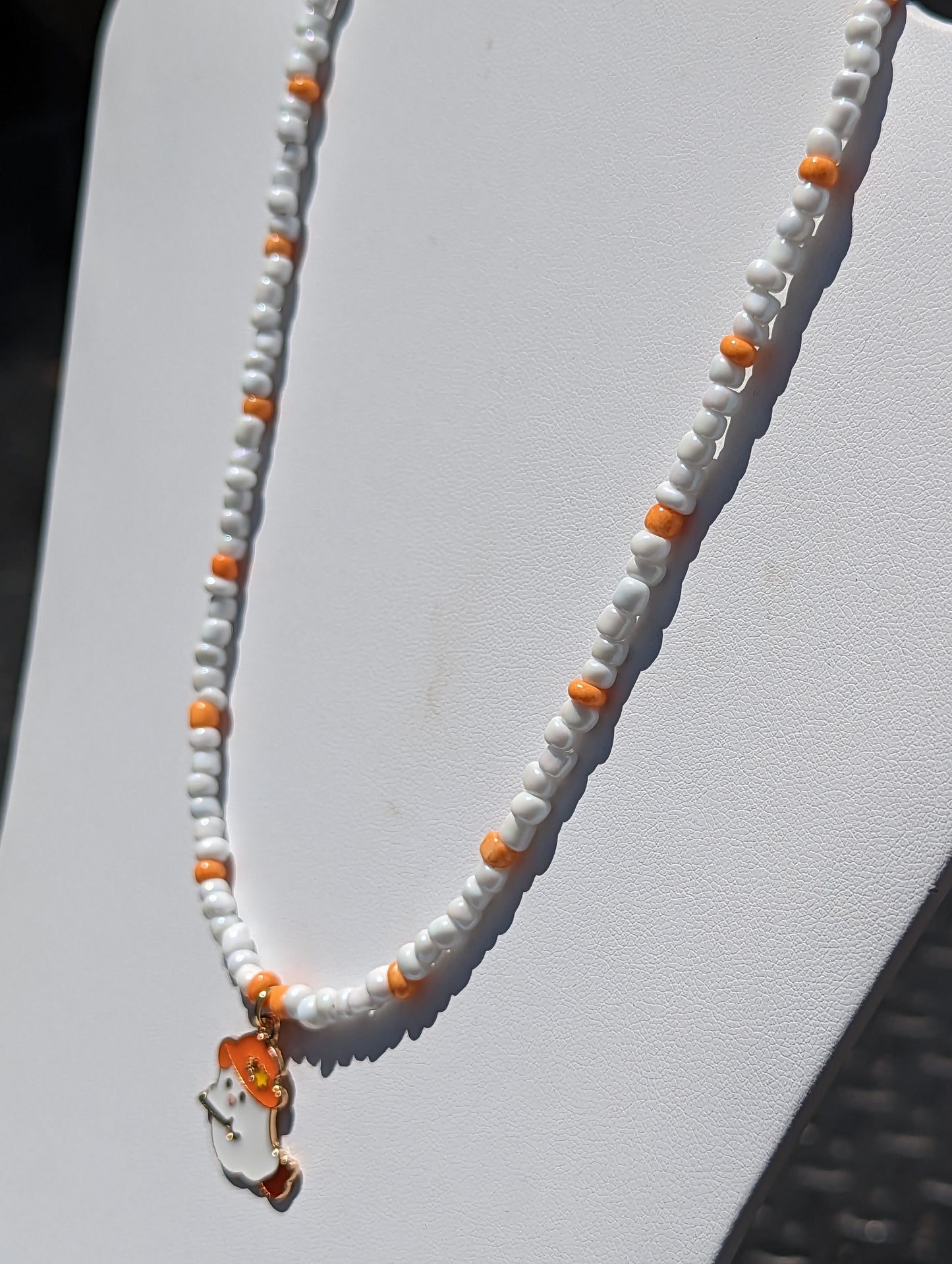 Friendly Ghost Pendant on White and Orange Beaded Necklace
