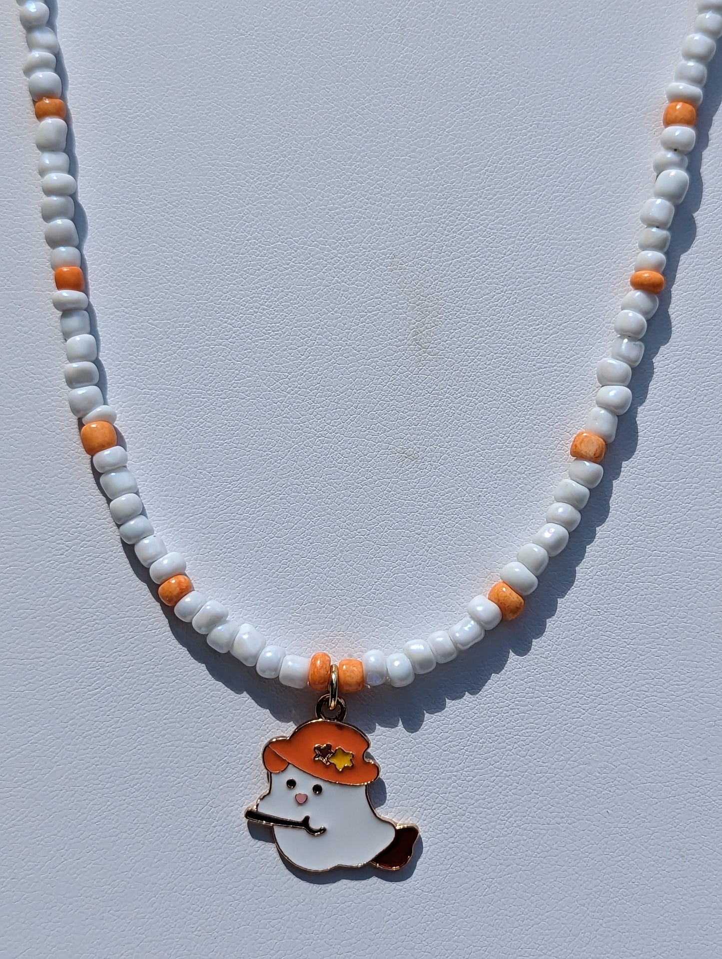 Friendly Ghost Pendant on White and Orange Beaded Necklace