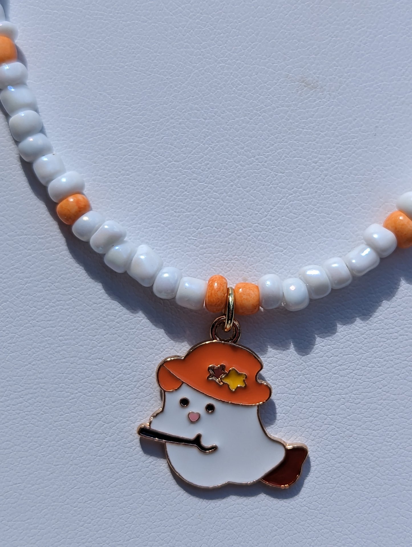 Friendly Ghost Pendant on White and Orange Beaded Necklace