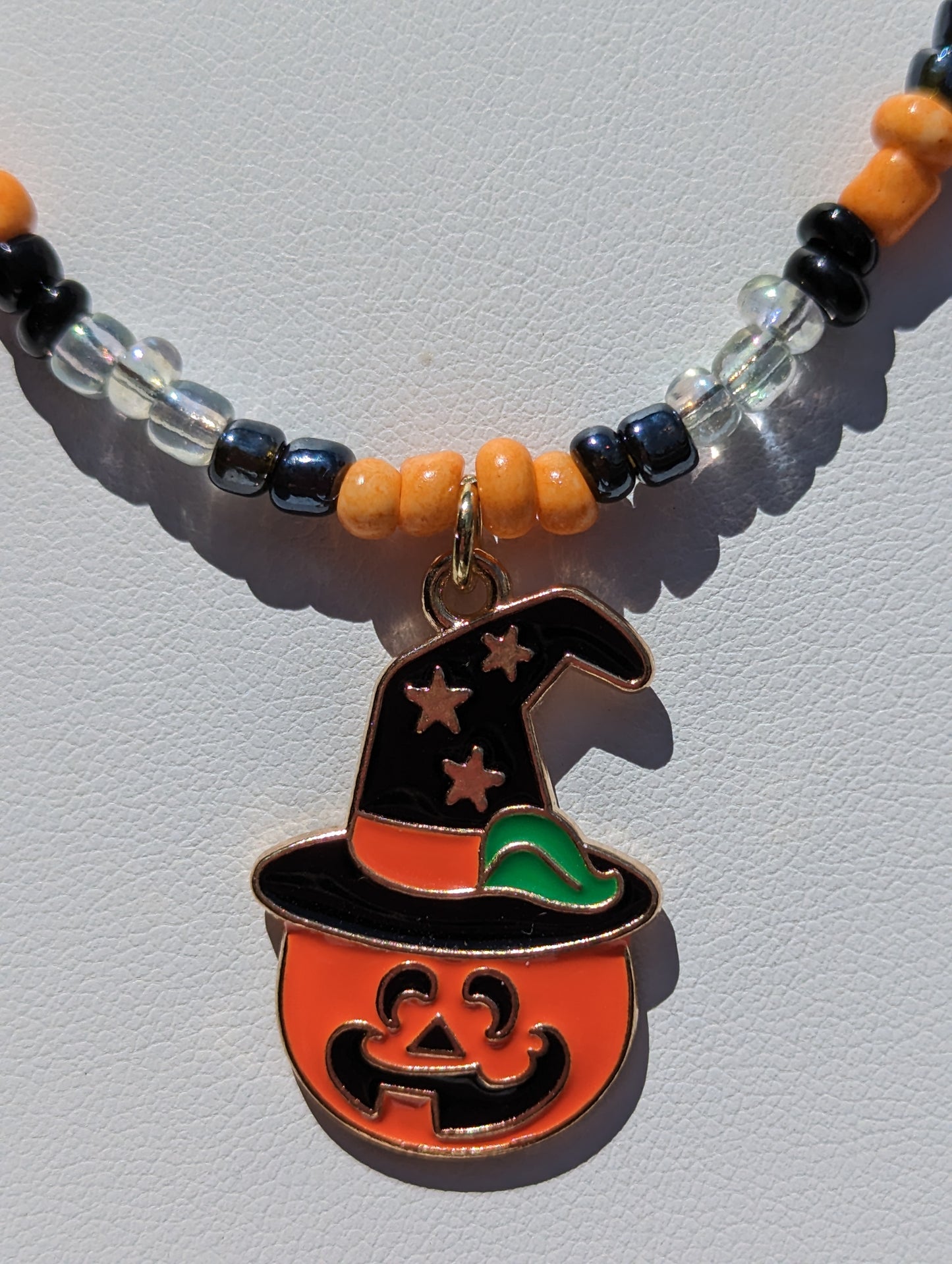 Jack-o-Lantern Witch Charm on Beaded Necklace