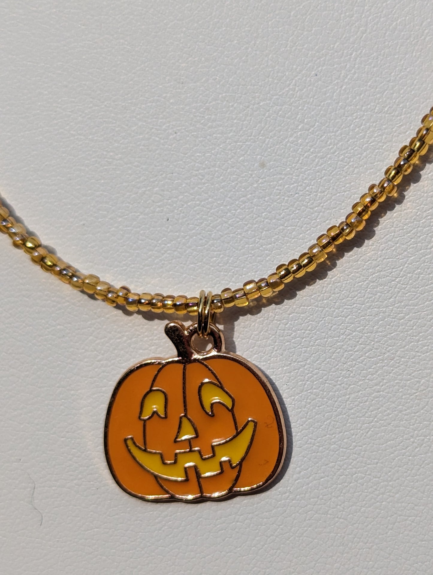 Friendly Jack-o-Lantern Charm on Beaded Necklace