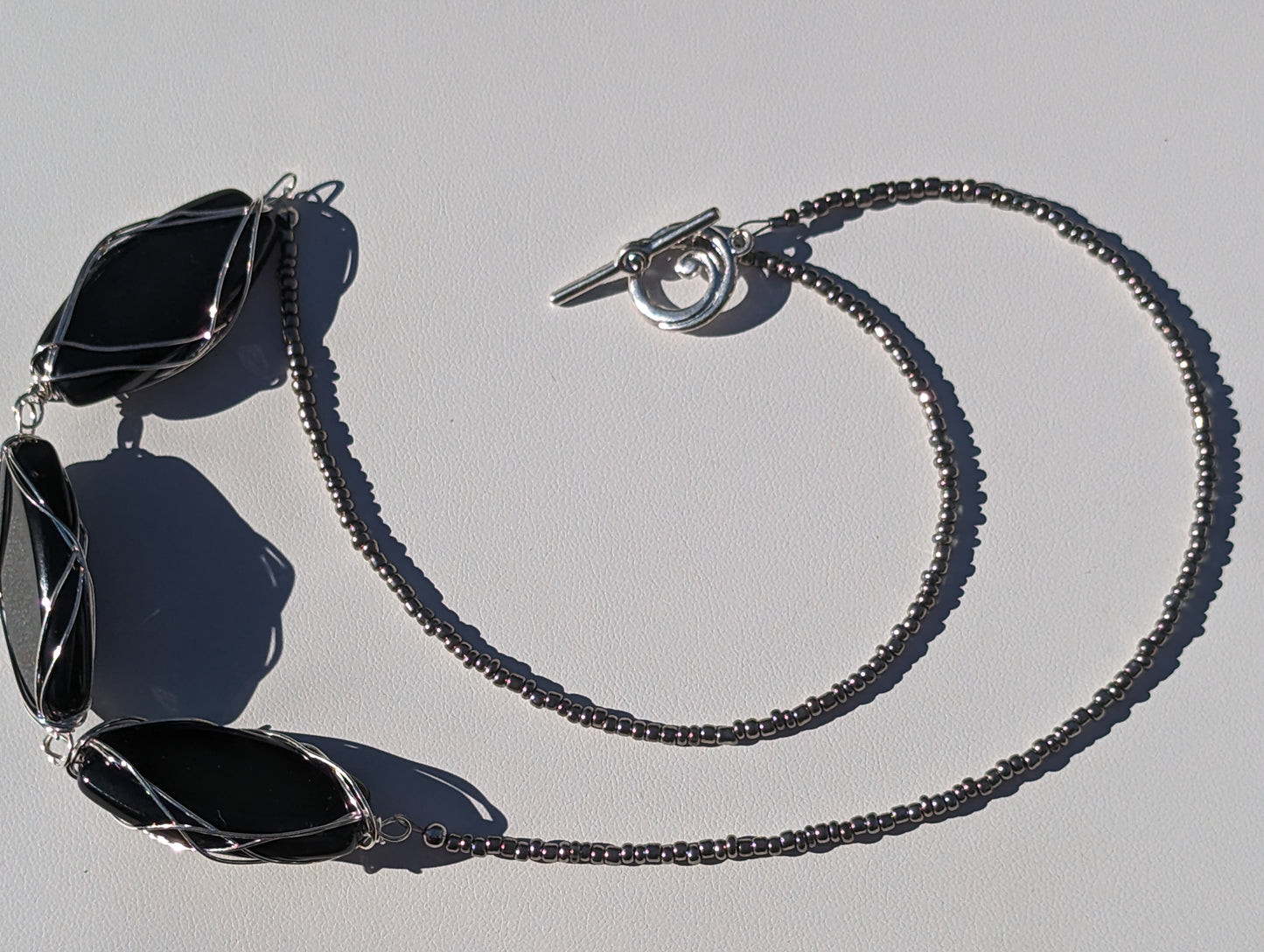 Charcoal Seed Bead Necklace with Large Wire-wrapped Black Glass Beads