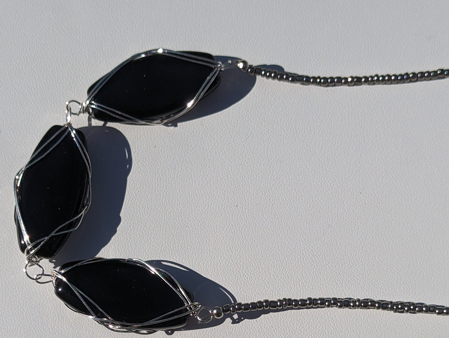 Large Wire-wrapped Black Glass Beads on Charcoal Seed Bead Necklace
