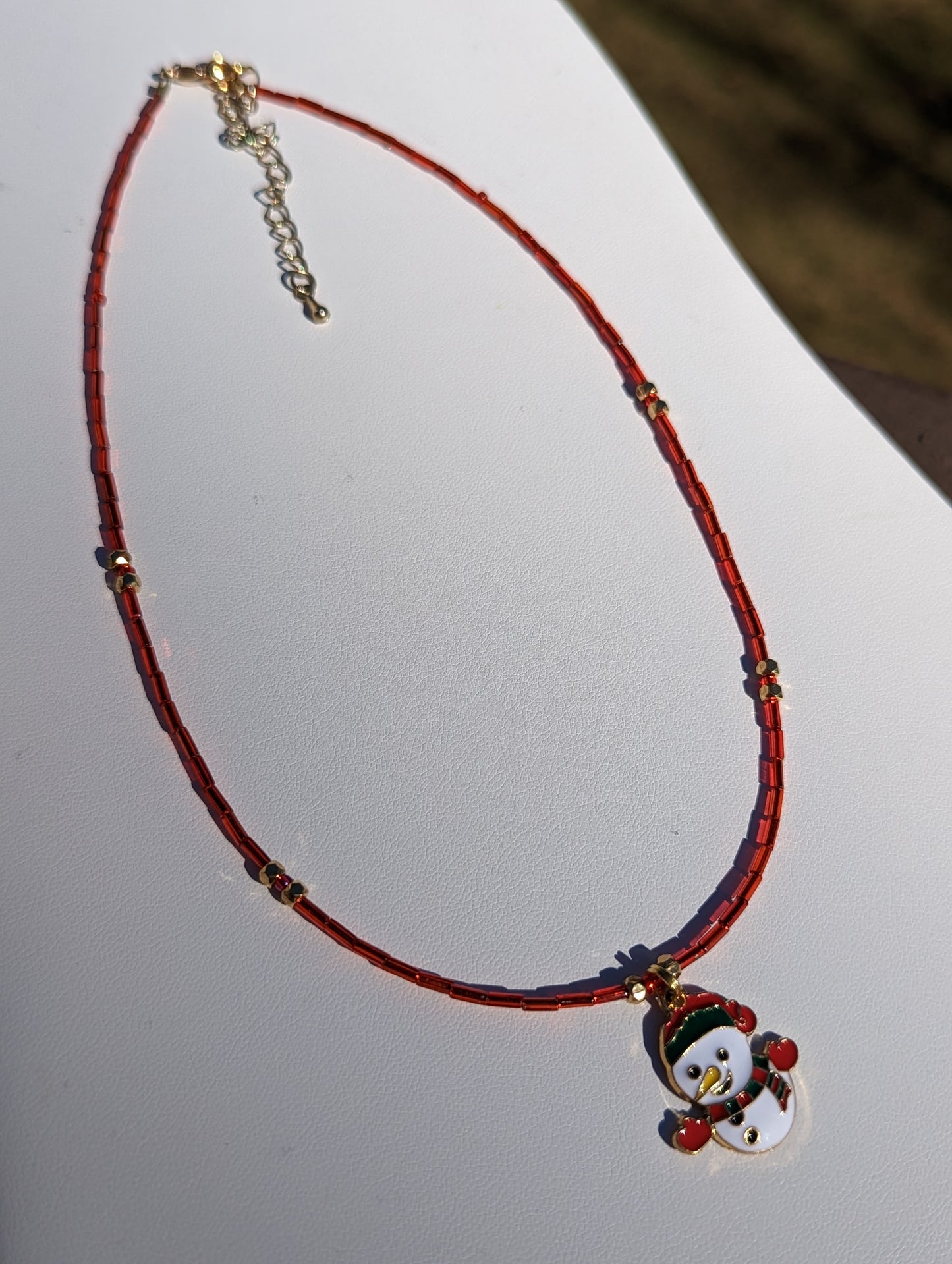 Gold-tone Enamel Snowman Charm on Bugle Bead Necklace