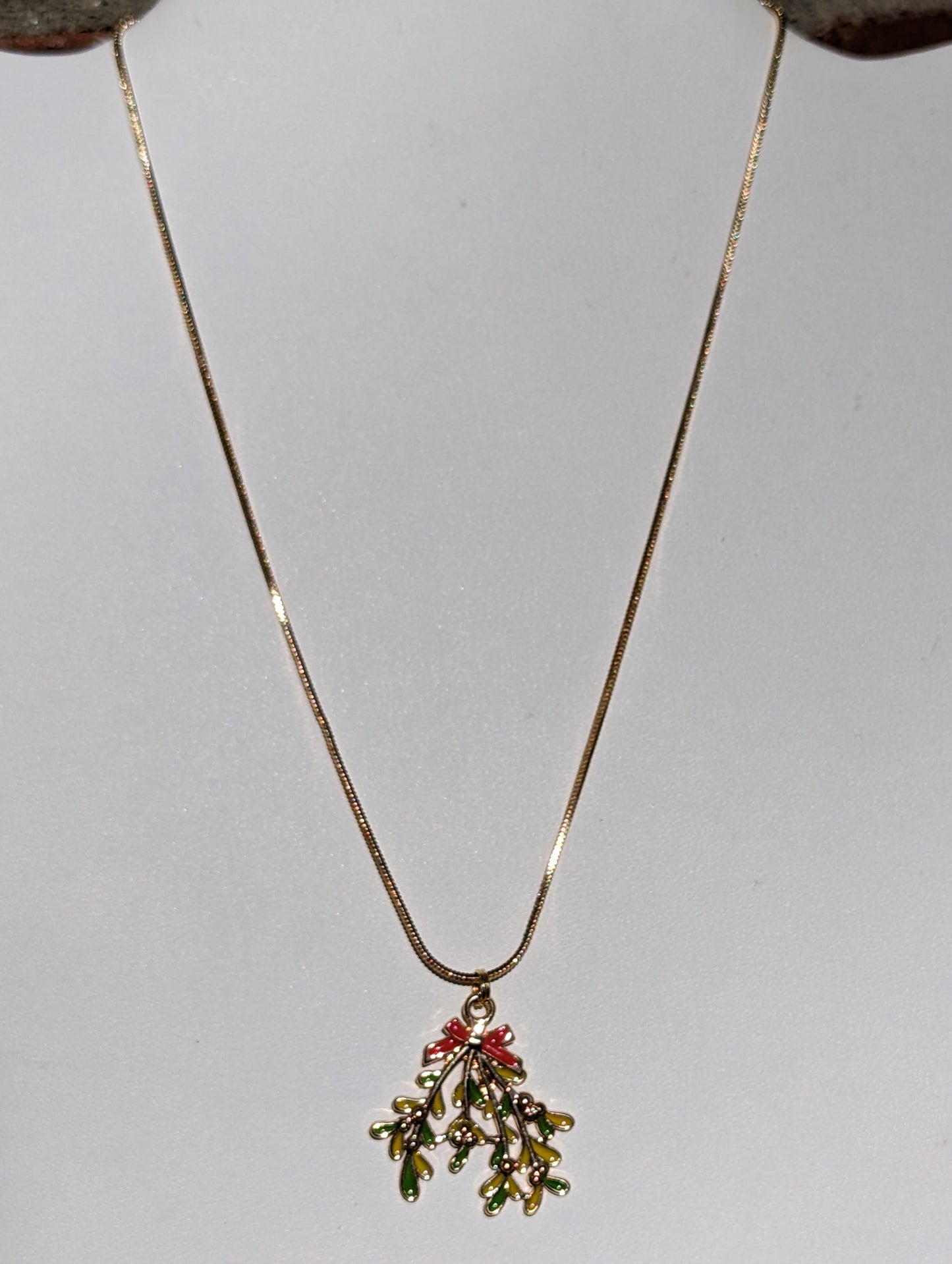 Golden Necklace with Mistletoe Pendant