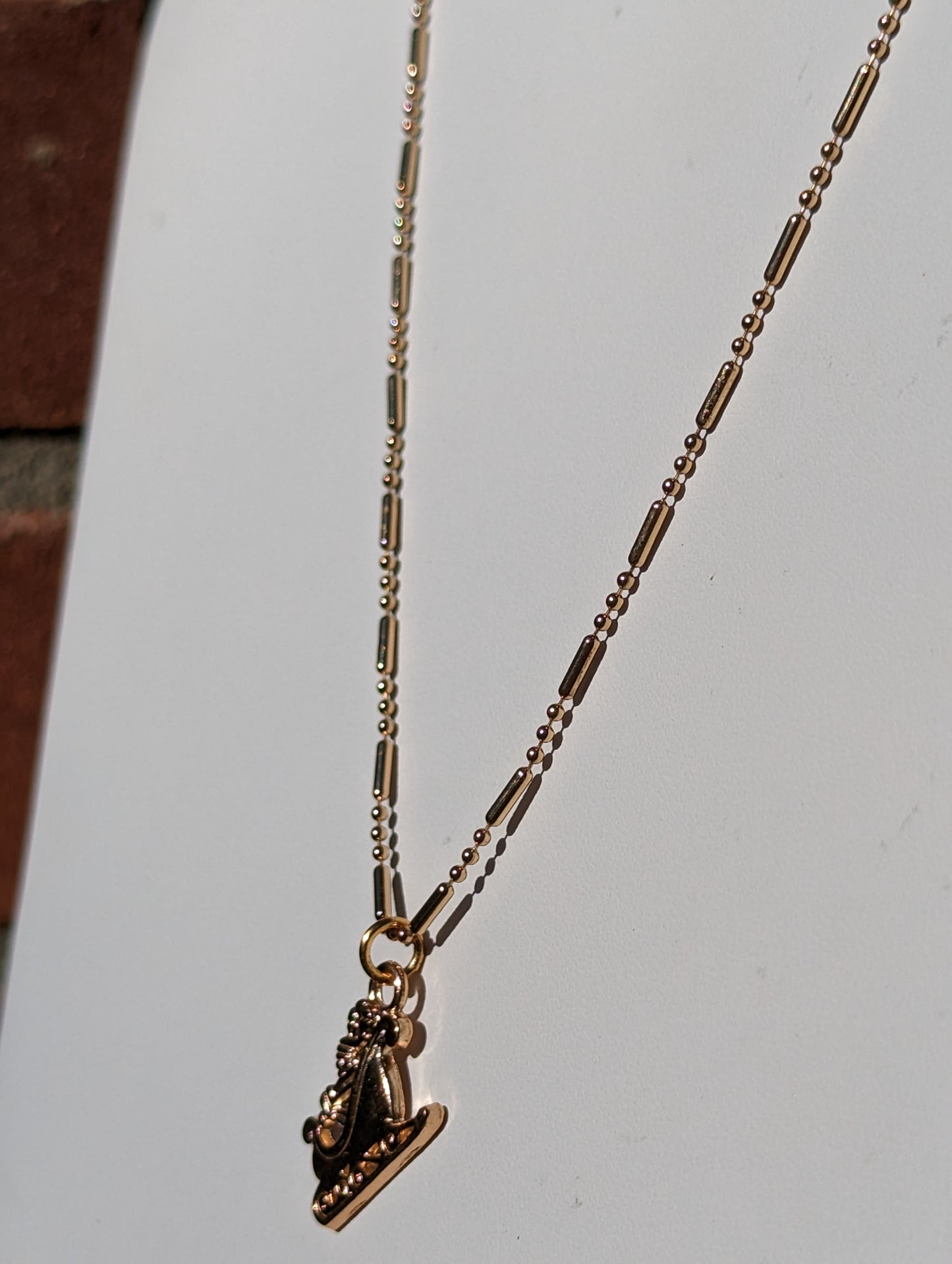 Golden Choker Necklace with Gold-tone Sleigh Pendant