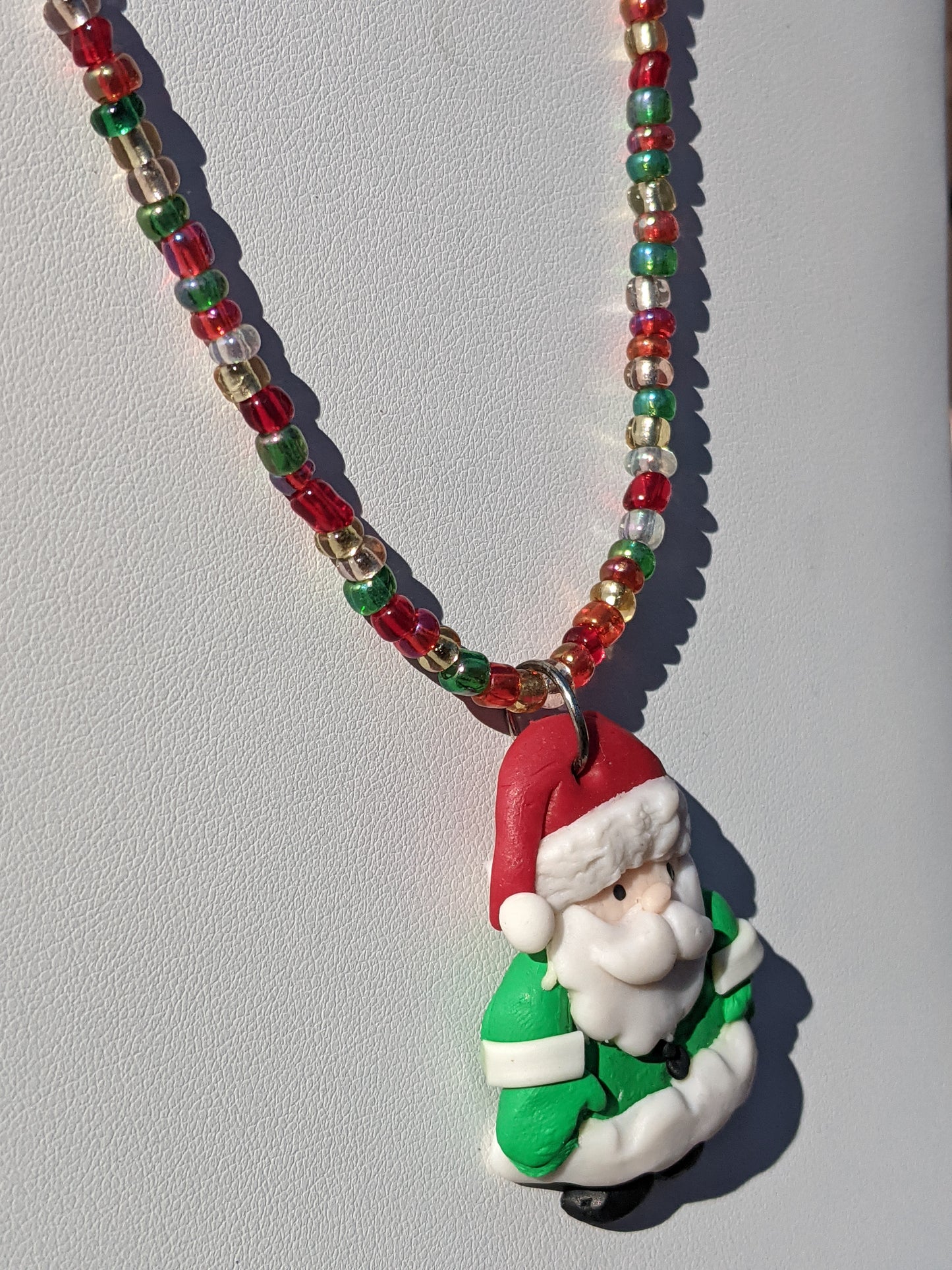 Clay Santa on Multi-colored Beaded Necklace