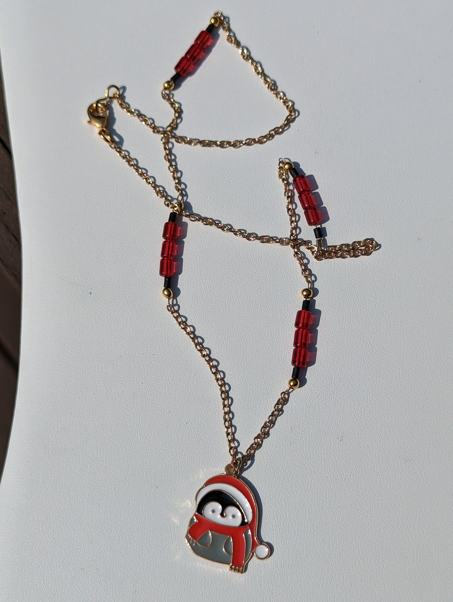 Santa Penguin Charm on Gold-tone Necklace