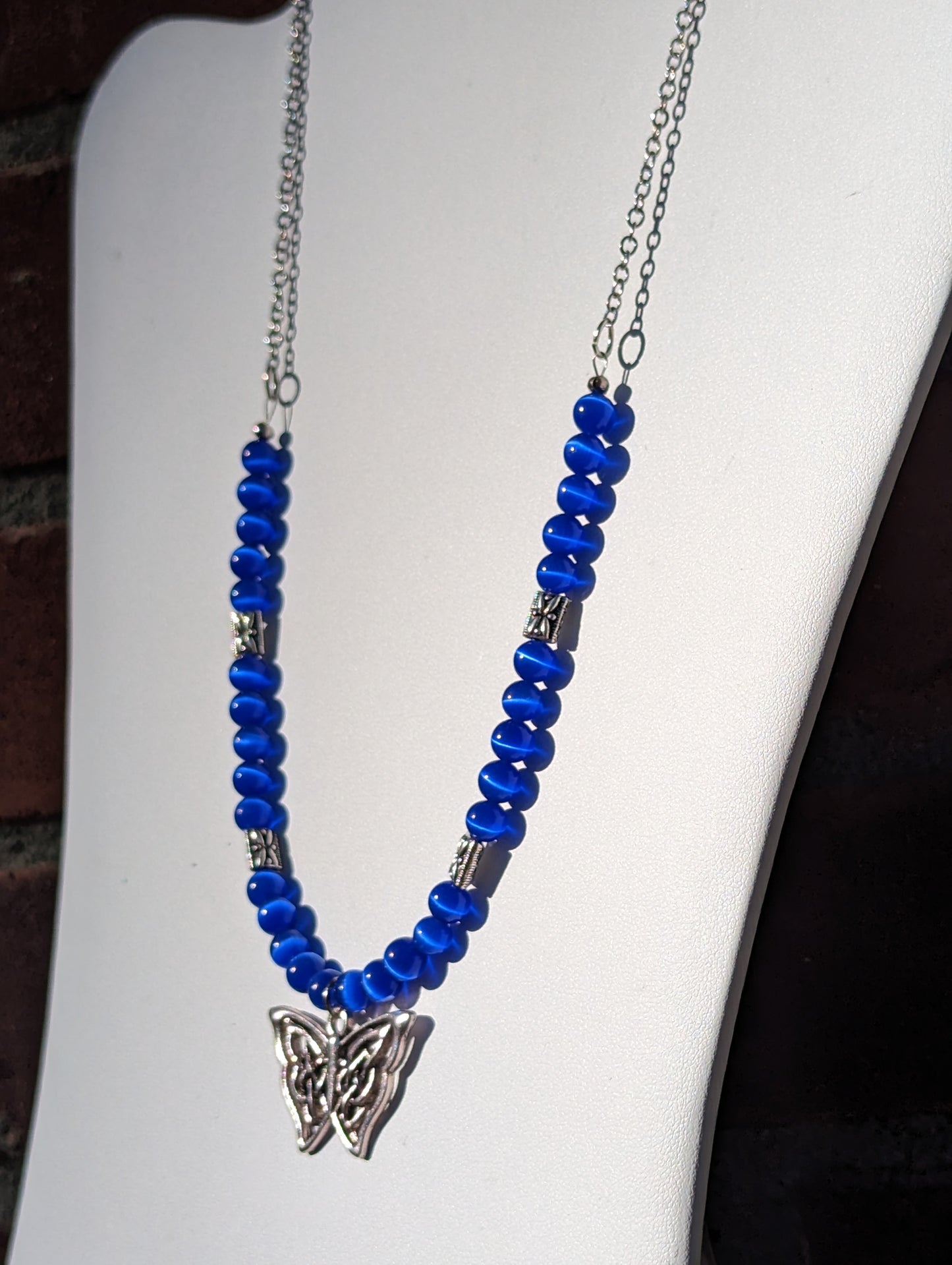 Royal Blue Cat's Eye Necklace with Celtic Butterfly Charm