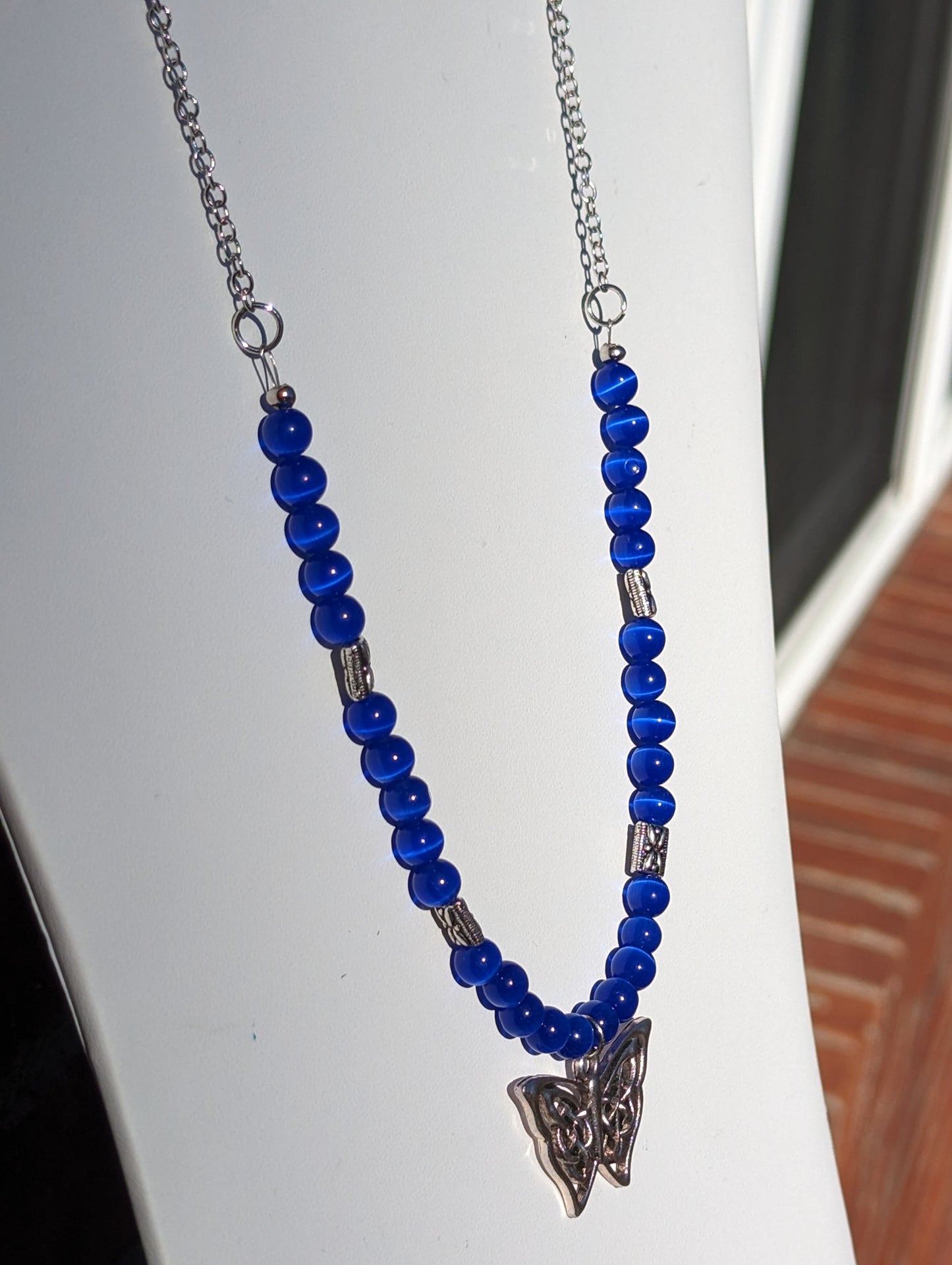 Royal Blue Cat's Eye Necklace with Celtic Butterfly Charm