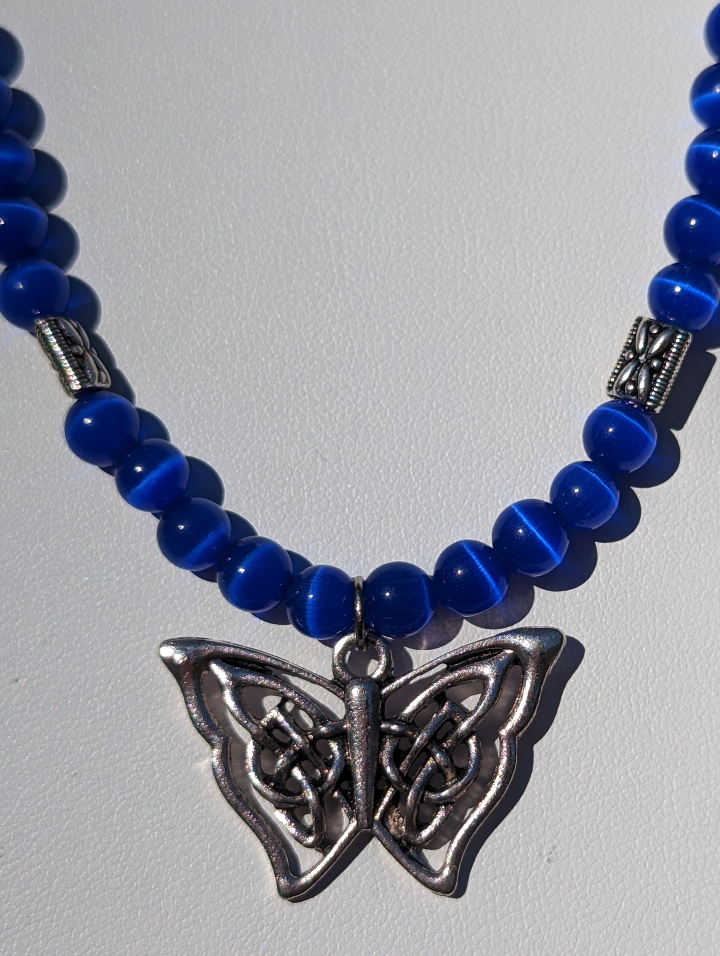 Royal Blue Cat's Eye Necklace with Celtic Butterfly Charm