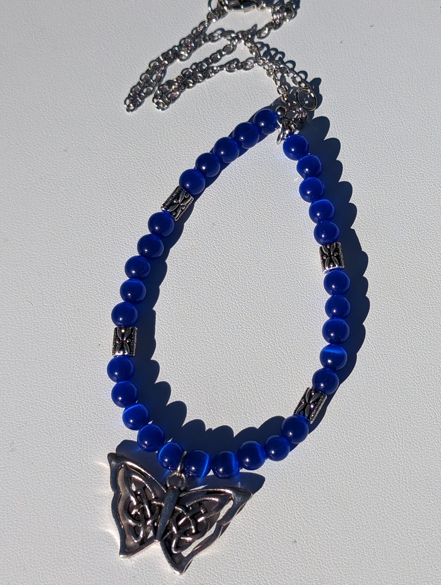 Royal Blue Cat's Eye Necklace with Celtic Butterfly Charm