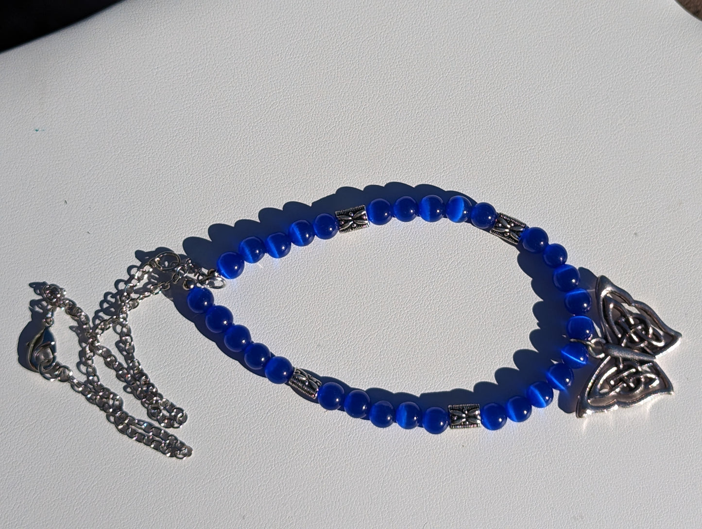 Royal Blue Cat's Eye Necklace with Celtic Butterfly Charm