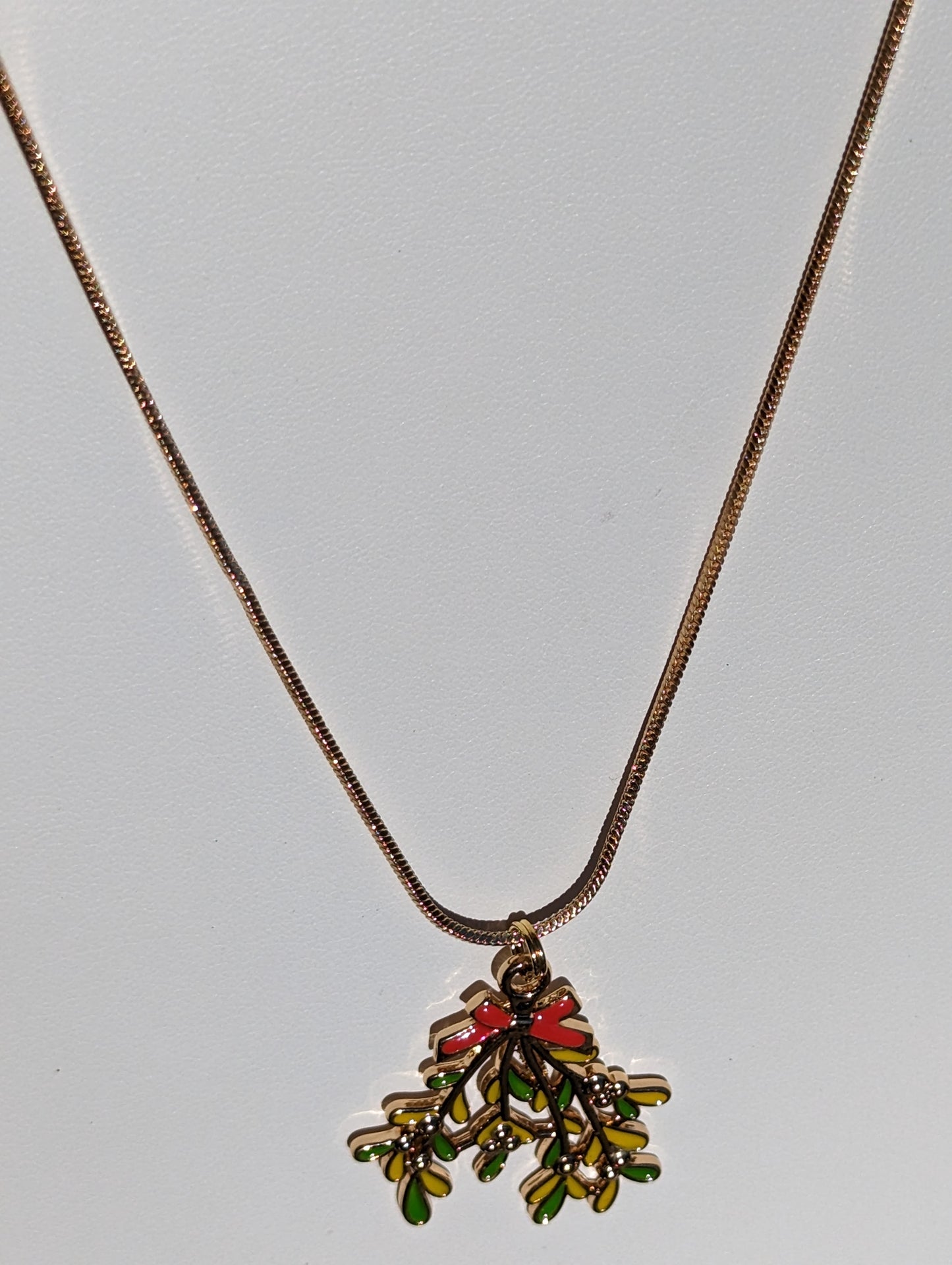 Golden Necklace with Mistletoe Pendant