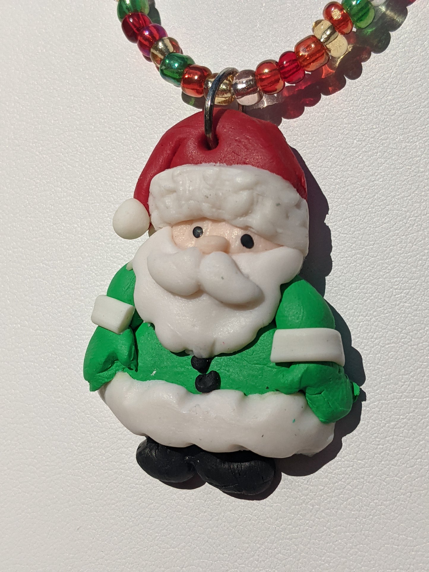 Clay Santa on Multi-colored Beaded Necklace