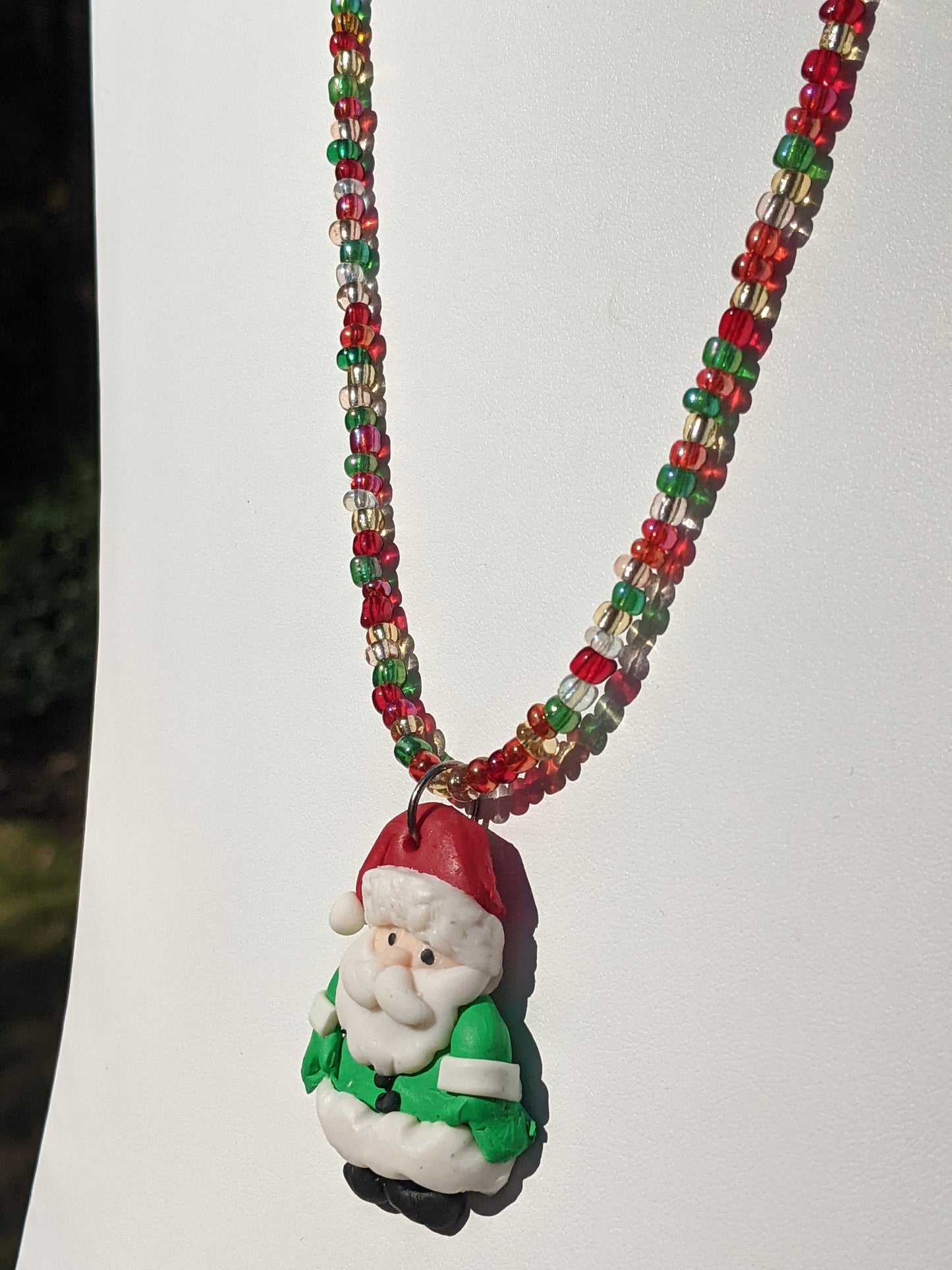 Clay Santa on Multi-colored Beaded Necklace