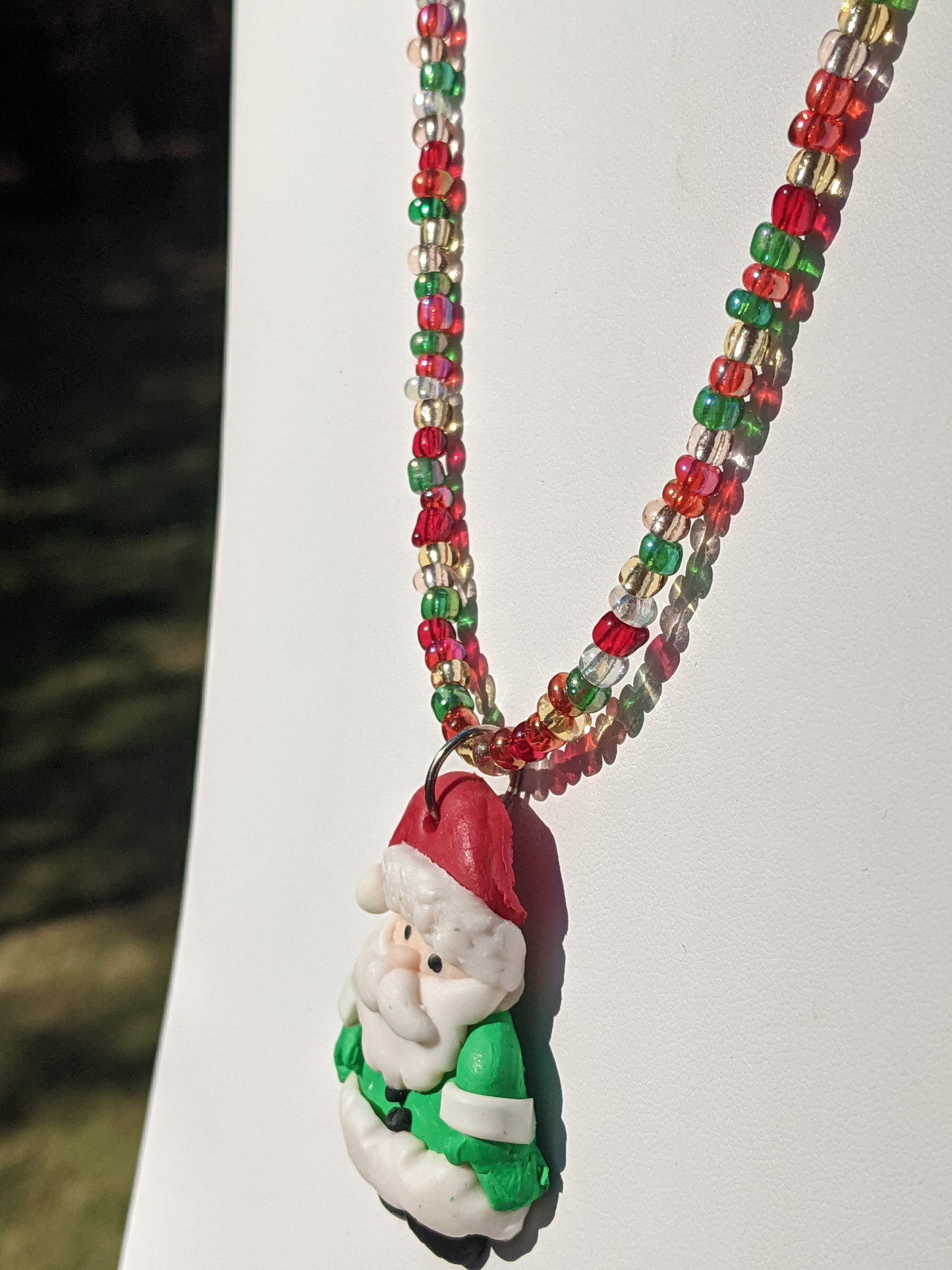 Clay Santa on Multi-colored Beaded Necklace